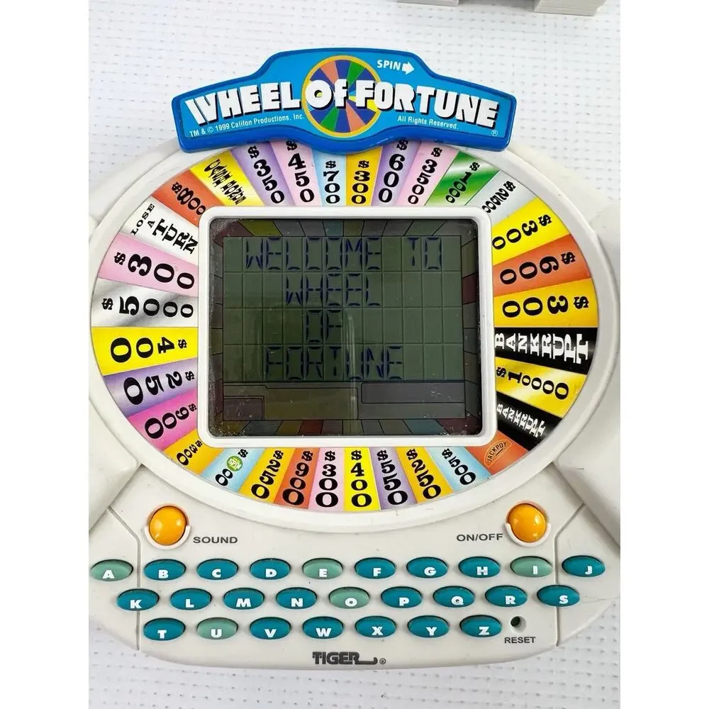 VTG 1998 Tiger WHEEL OF FORTUNE Electronic Handheld Game 2 Cartridges WORKS!